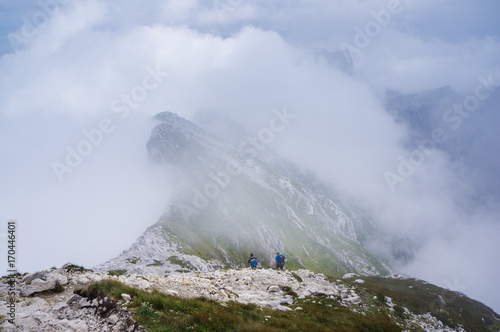 Hikers on descending Mt. Mangart to Mangart saddle.