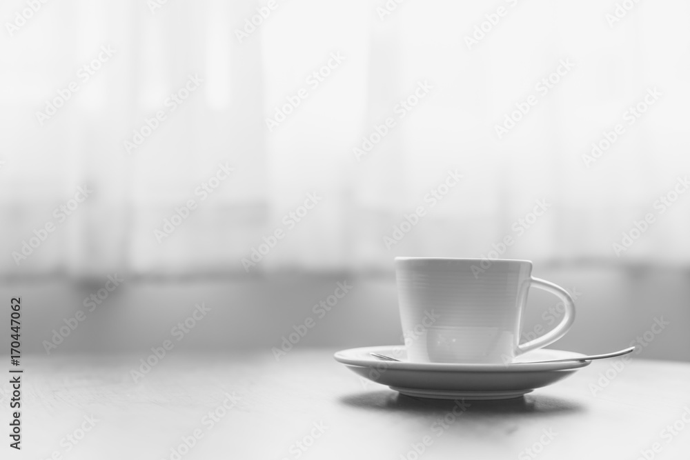 coffee in the morning, a cup of espresso on wood table in cafe or coffeeshop. coffee in the morning, a cup of espresso on wood table in cafe or coffeeshop.