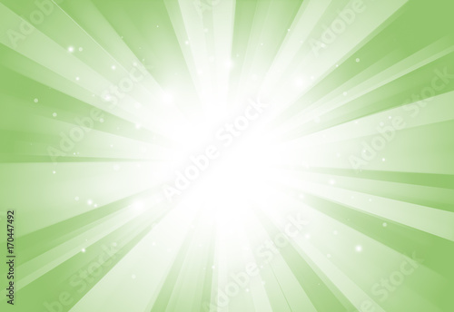 Soft Green glitter sparkles rays lights bokeh festive elegant abstract background.