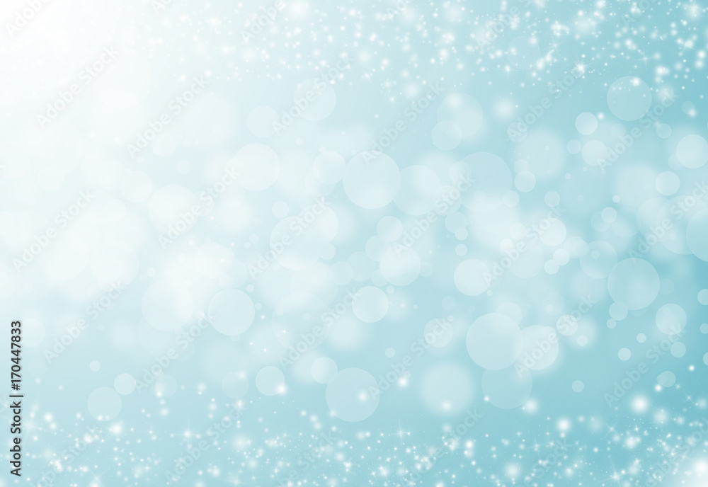 Soft Blue glitter sparkles rays lights bokeh festive elegant abstract background.