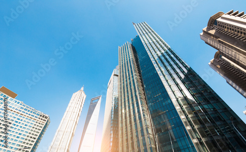 underside panoramic and perspective view to steel glass high rise building skyscrapers  business concept of successful industrial architecture