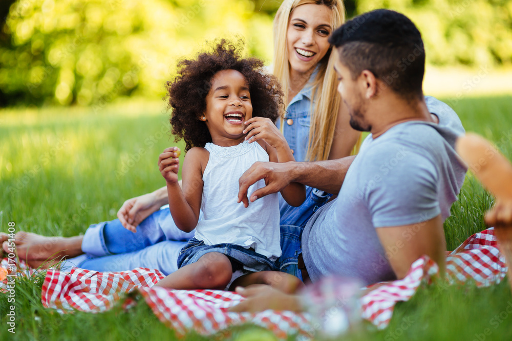 Happy family having fun time on picnic Happy family having fun time on picnic
