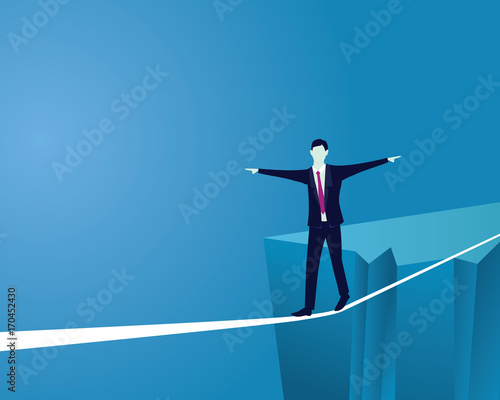 Businessman Walking on Rope. Risk Challenge in Business Concept © inamar