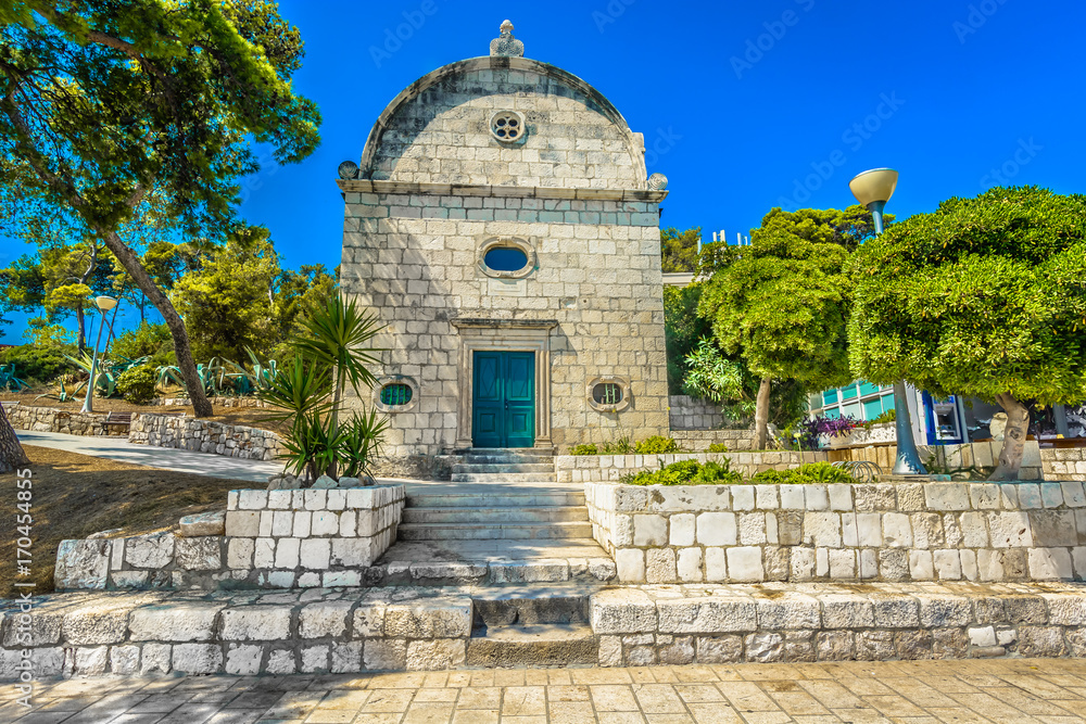 Obraz premium Small church landmark Hvar. / View at small church on Island Hvar, historic landmarks in Croatia, Europe.