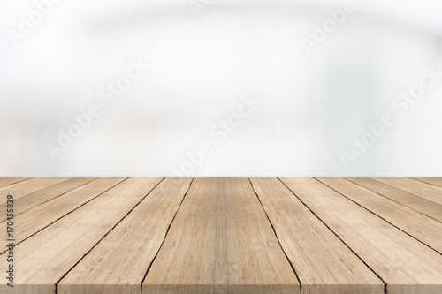 Wood table top on white blurred background,for montage your products