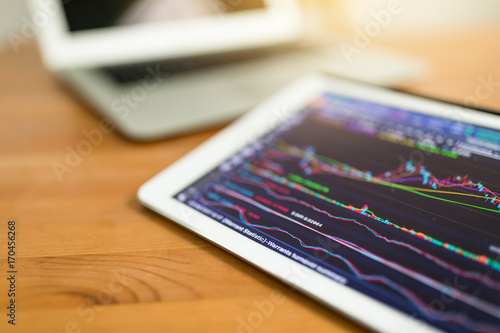 Stock market graph on tablet computer