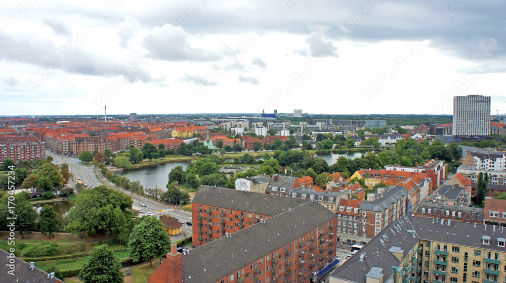 Cityscape, aerial view from the observation deck at the top of the Church of Our Saviour, cloudy weather, Copenhagen, Denmark
