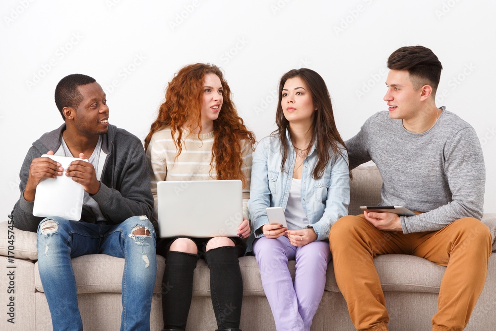 Young people using gadgets, students, technology Young people using gadgets, students, technology