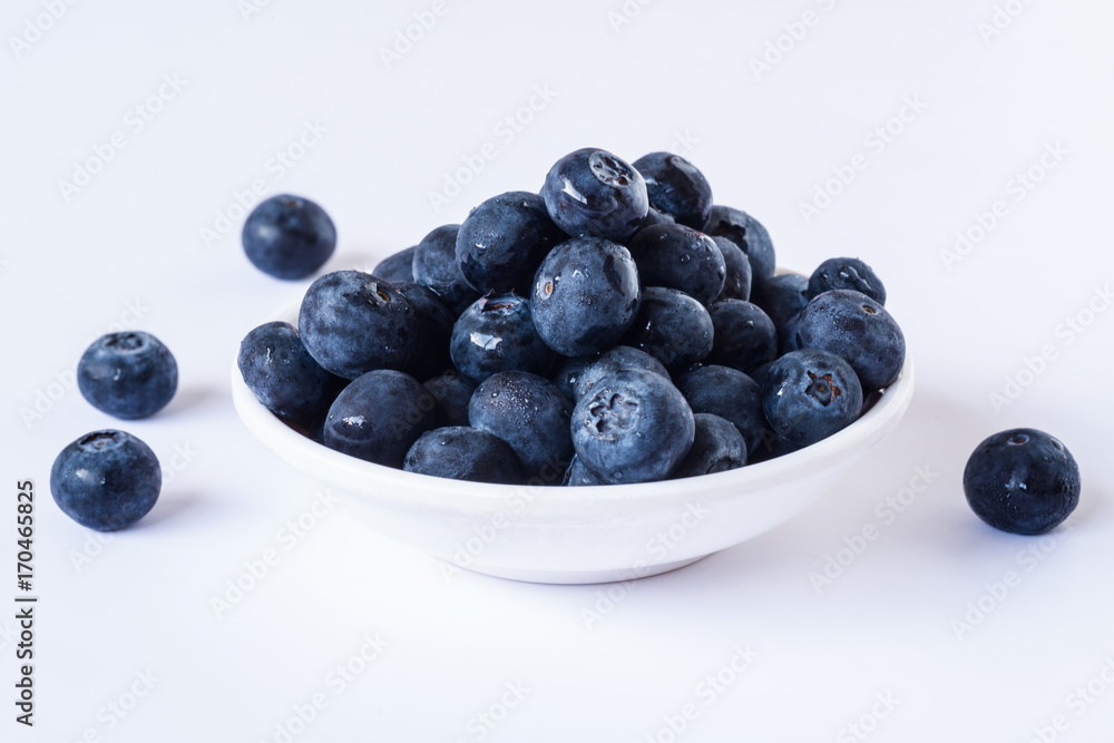Blue Berry Fruits in a bowl, white back ground Blue Berry Fruits in a bowl, white back ground