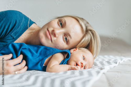 Newborn baby in mom's arms