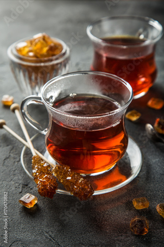 two glasses of tea with caramelized sugar