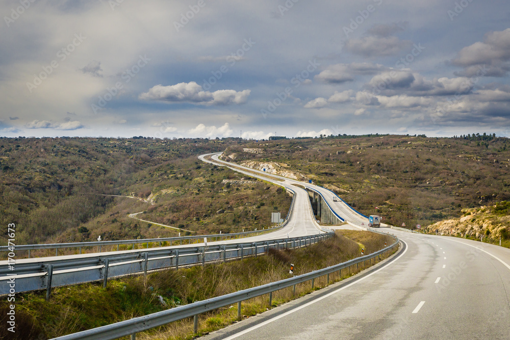 The highway in rural hills of Spain