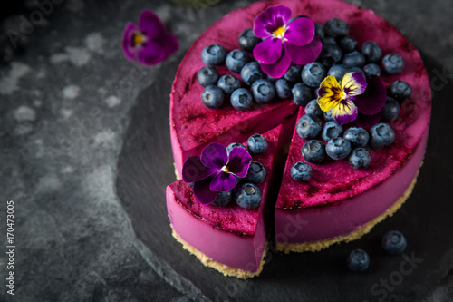 Fototapeta Naklejka Na Ścianę i Meble -  no baked blueberry mousse cake on dark background