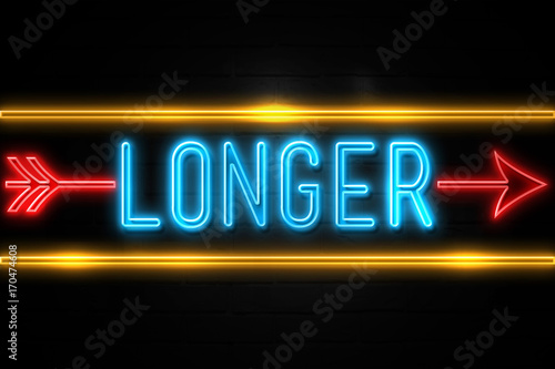Longer  - fluorescent Neon Sign on brickwall Front view photo