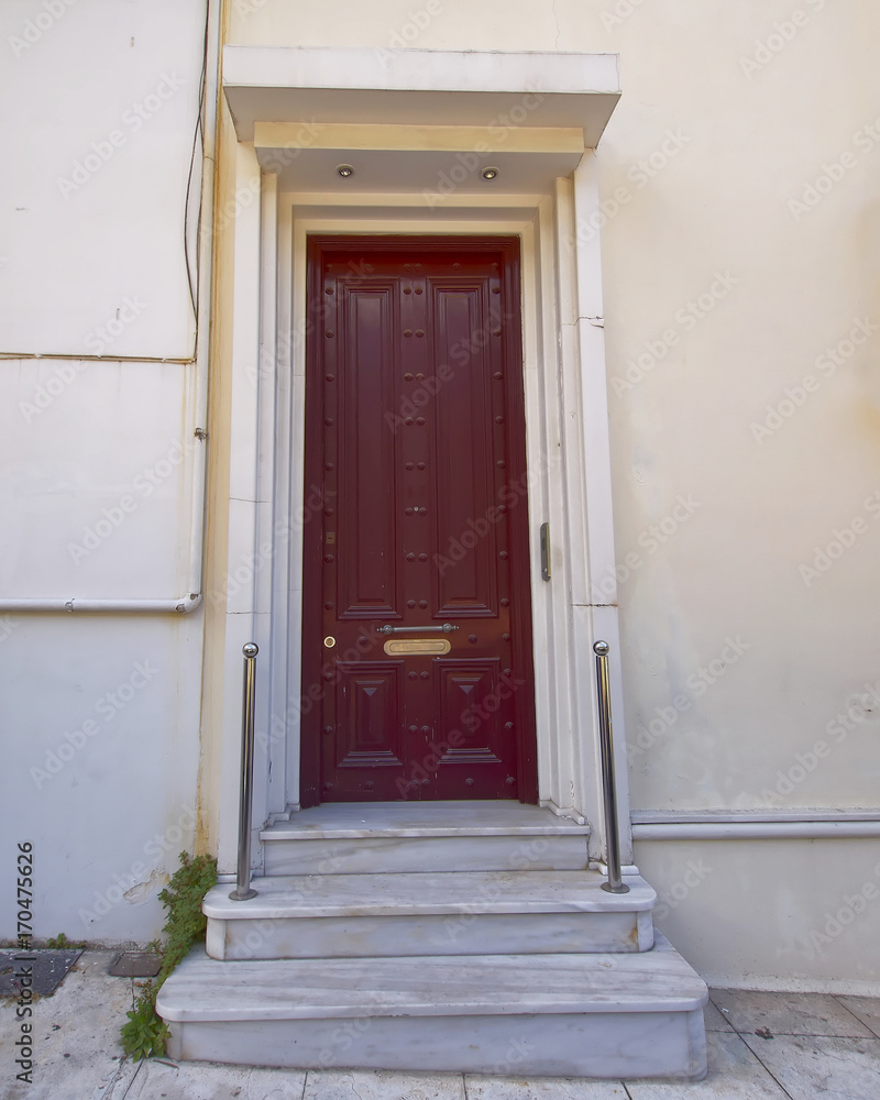 Fototapeta premium elegant house entrance with metallic door, Athens Greece