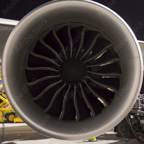 A night photo of the intake of a large jet engine of a Boeing 777 aircraft in Cincinnati, Ohio, USA