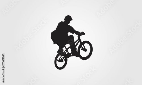 Cyclist rider bmx performs trick jump logo silhouette vector