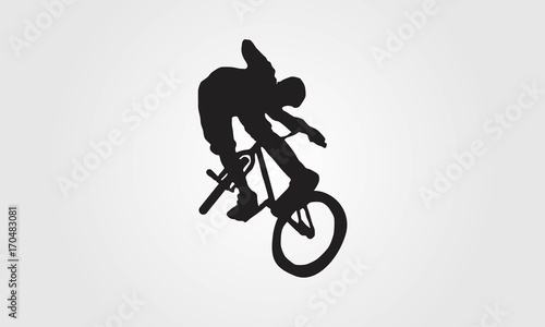 Cyclist rider bmx performs trick jump logo silhouette vector