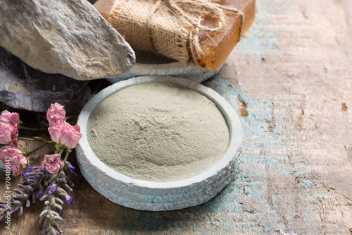 Nature cosmetics, handmade preparation with essential oils and ancient minerals of creams, soaps, skincare masks, scrubs from fresh and dried lavender and roses flowers, green clay powder photo