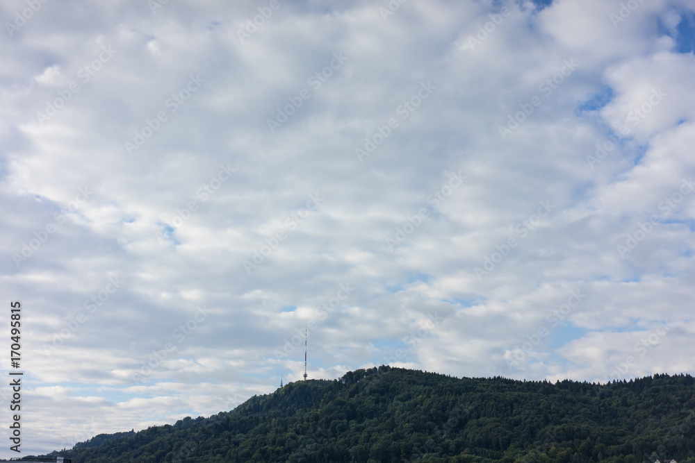 uetliberg mountain in zurich switzerland with tv tower and cloudy sky uetliberg mountain in zurich switzerland with tv tower and cloudy sky