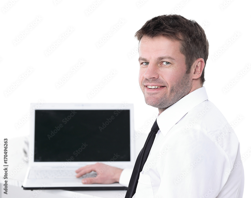 Happy middle aged business man working on laptop. Happy middle aged business man working on laptop.