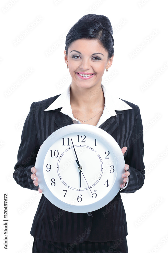 Successful business woman with clock posing against white Successful business woman with clock posing against white