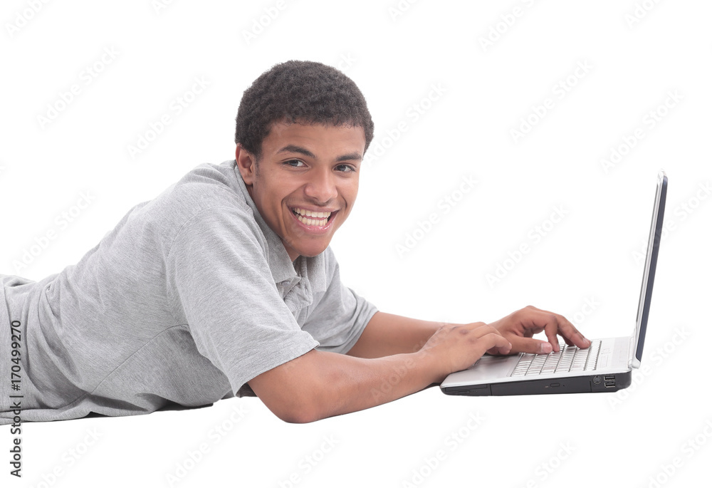 Happy african man with a laptop - isolated over white Happy african man with a laptop - isolated over white