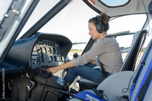 young woman helicopter pilot