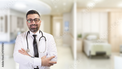 male doctor portrait at hospital photo