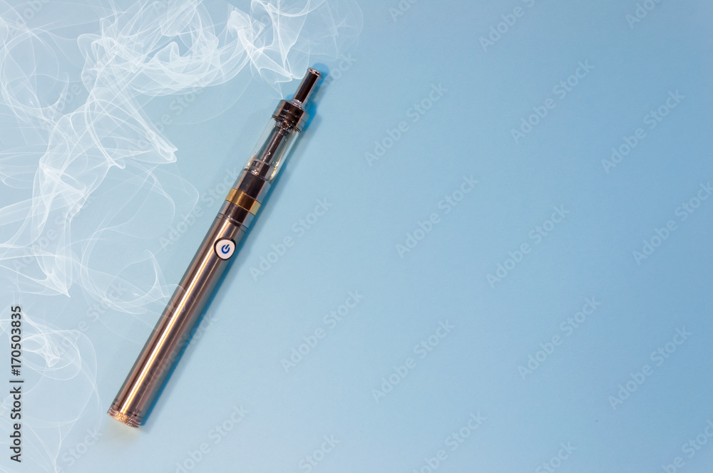 An electronic cigarette, a vape,  lie on a blue background.  with smoke around