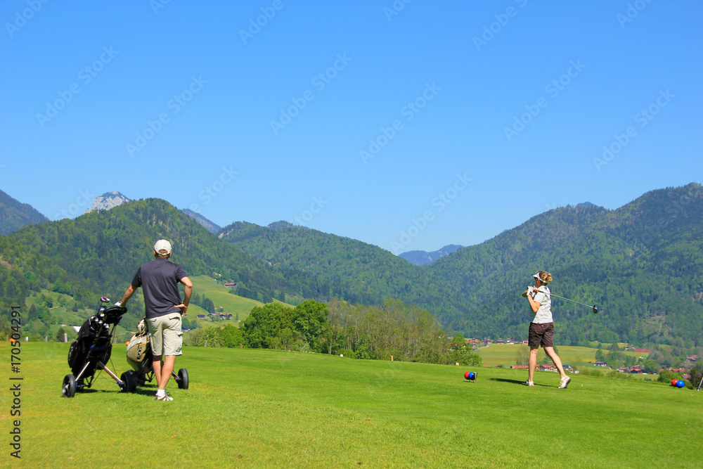 People playing Golf