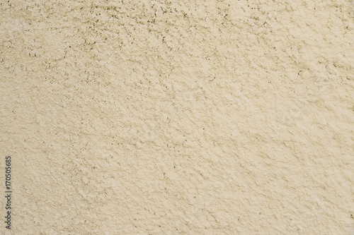 Old beige painted wall background texture
