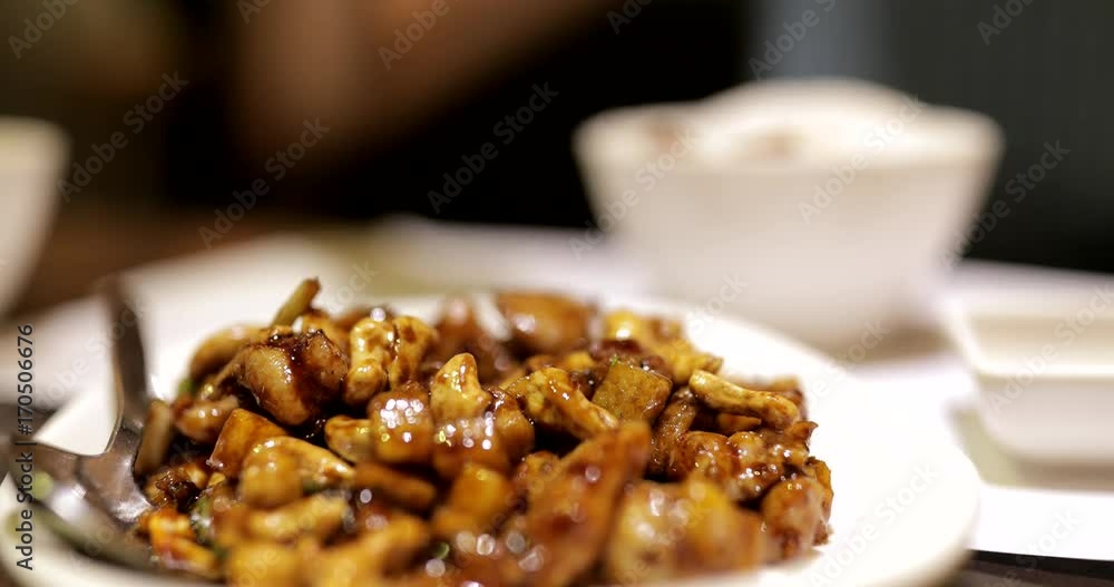 Woman enjoy chinese dish in restaurant Woman enjoy chinese dish in restaurant