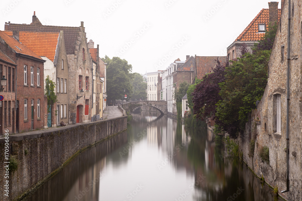 Bruges Canal On Misty Day