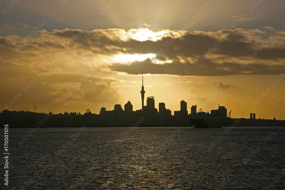 Auckland skyline during a golden sunset, New Zealand
