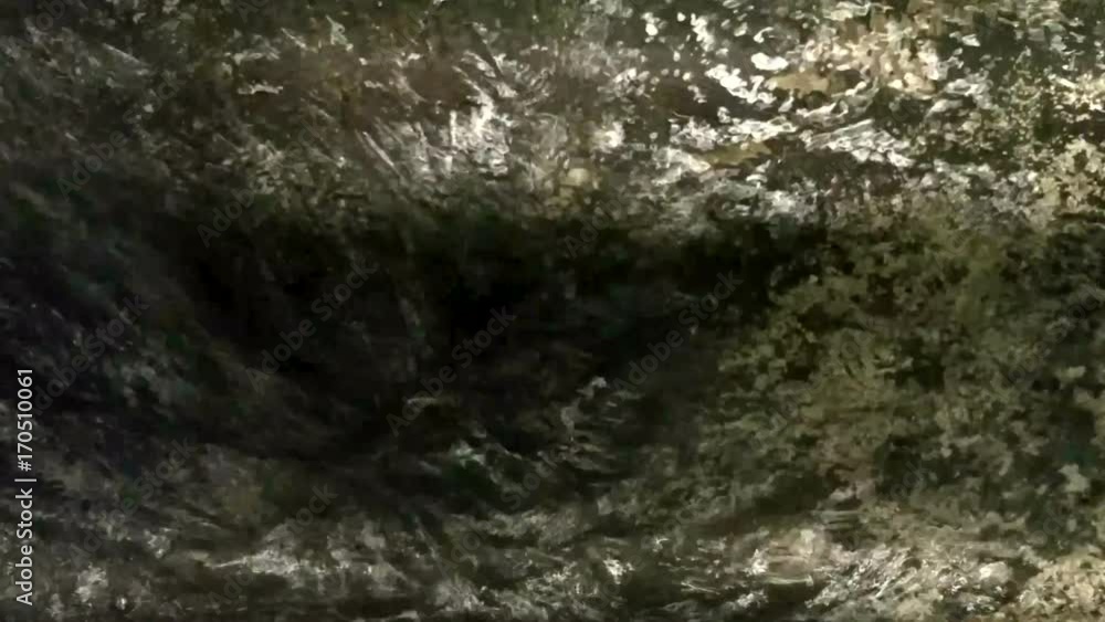 Close up of clean hot water gushing along and old gully Close up of clean hot water gushing along and old gully