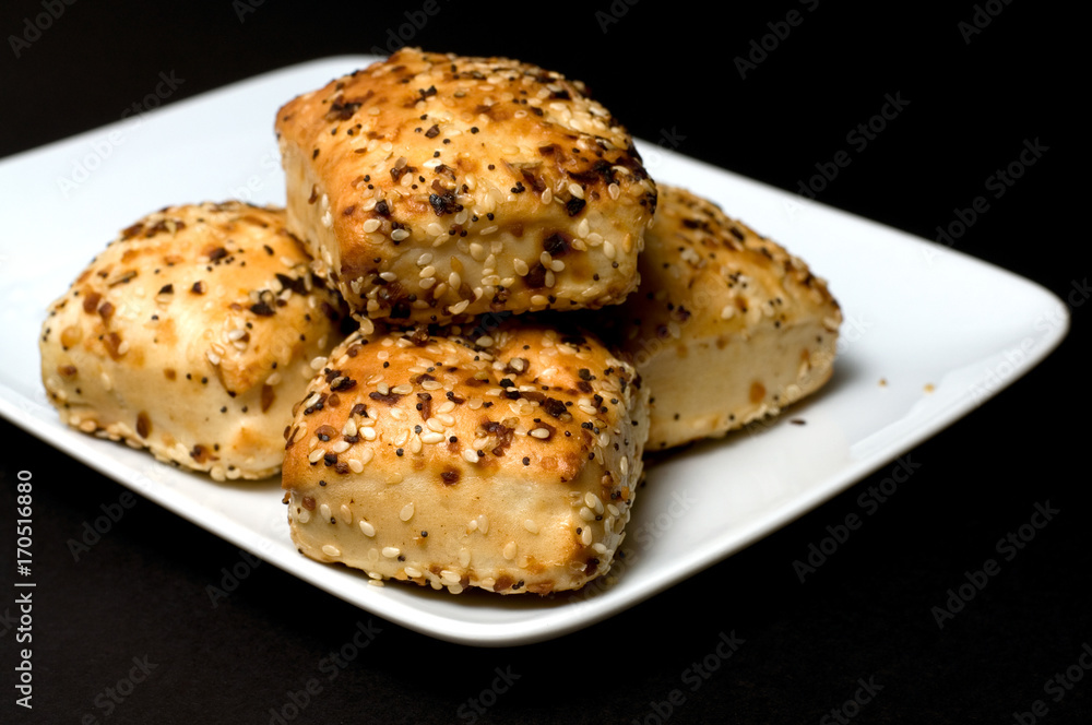 Foccacia Breads on a White Plate with Dark Background