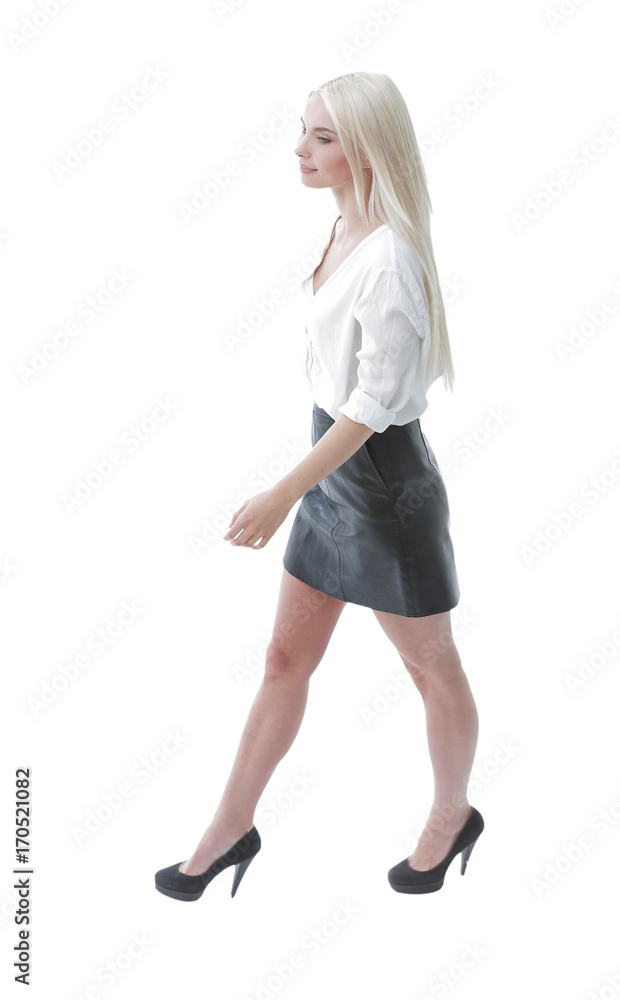 side view. The responsible young employee of the company goes ahead. . photo in full growth. side view. The responsible young employee of the company goes ahead. . photo in full growth.