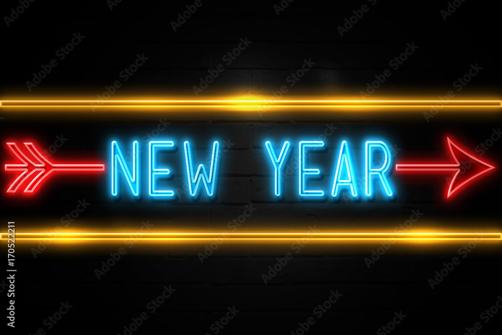 Obraz premium New Year - fluorescent Neon Sign on brickwall Front view
