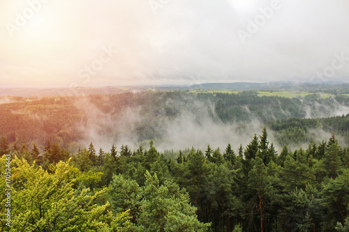 Misty fog with sun on hills  Czech landscape