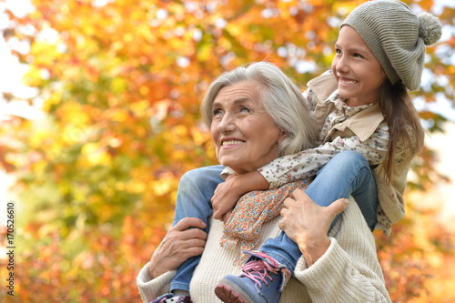 Fotografija grandmother and granddaughter having fun
