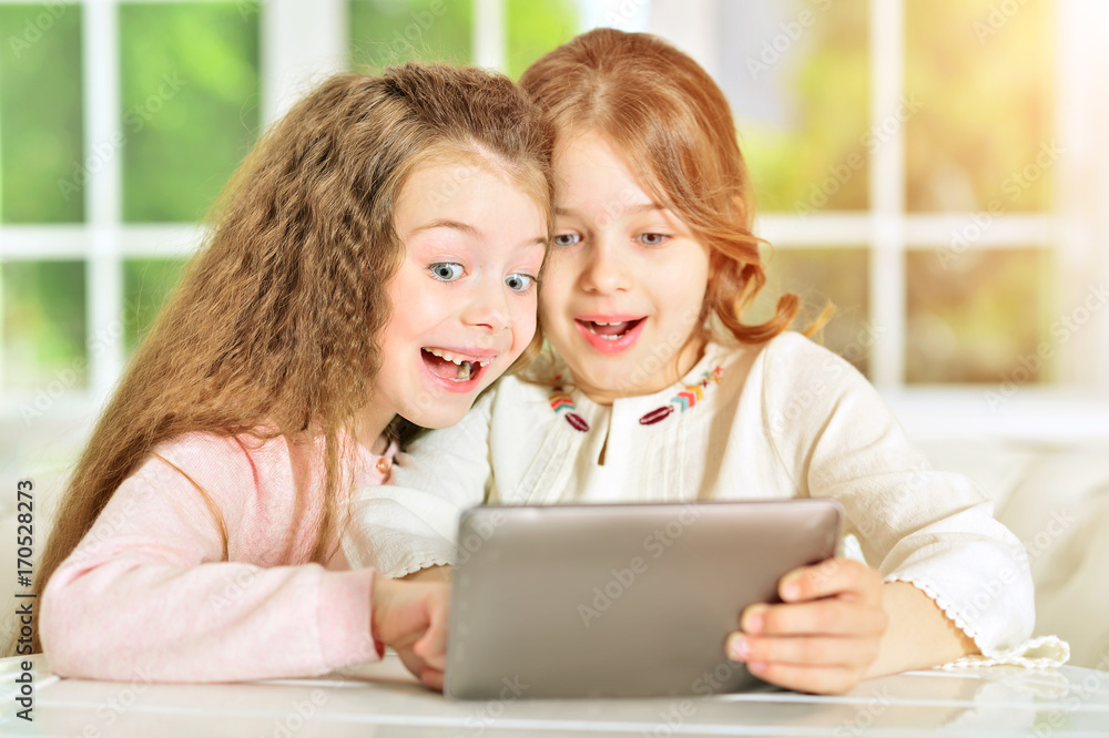 little girls using tablet little girls using tablet