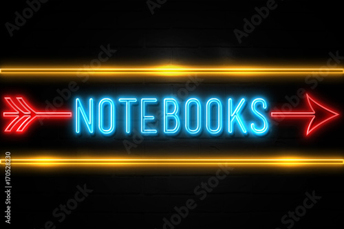 Notebooks  - fluorescent Neon Sign on brickwall Front view