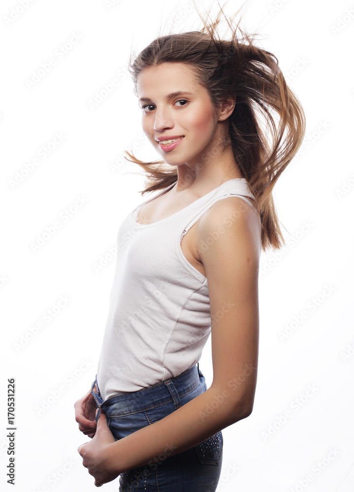 Young smiling blond girl on white background Young smiling blond girl on white background