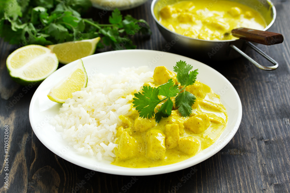 Yellow curry with chicken and rice. Asian cuisine. Yellow curry with chicken and rice. Asian cuisine.