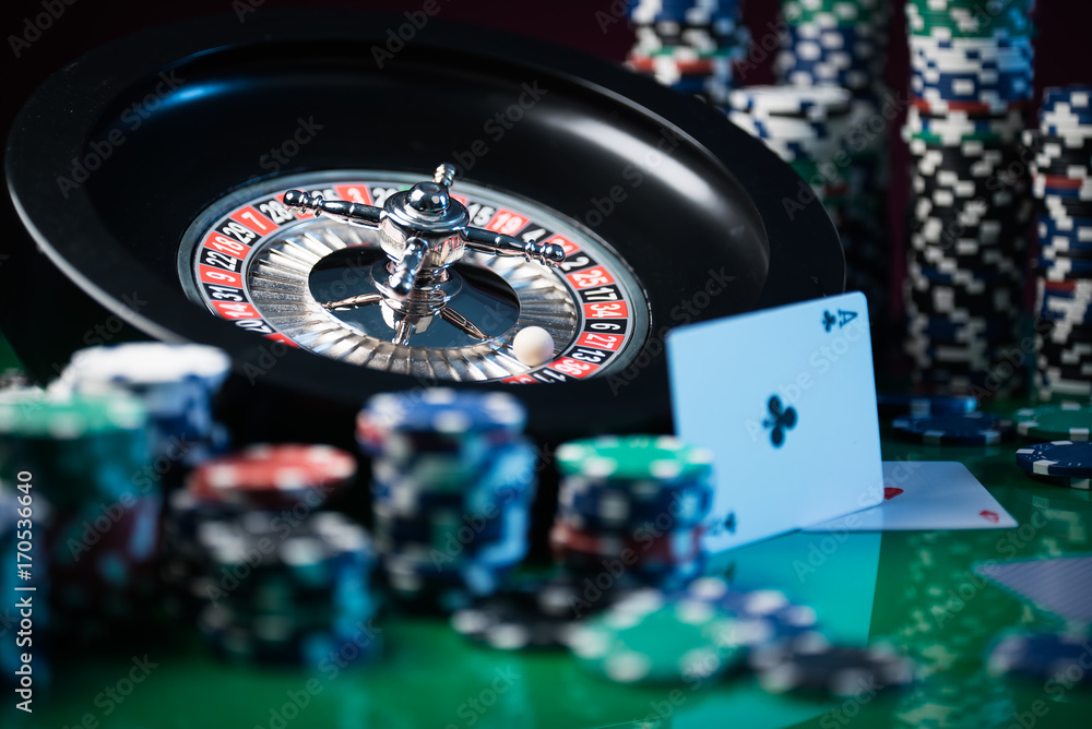 Roulette in casino and Poker Chips Roulette in casino and Poker Chips