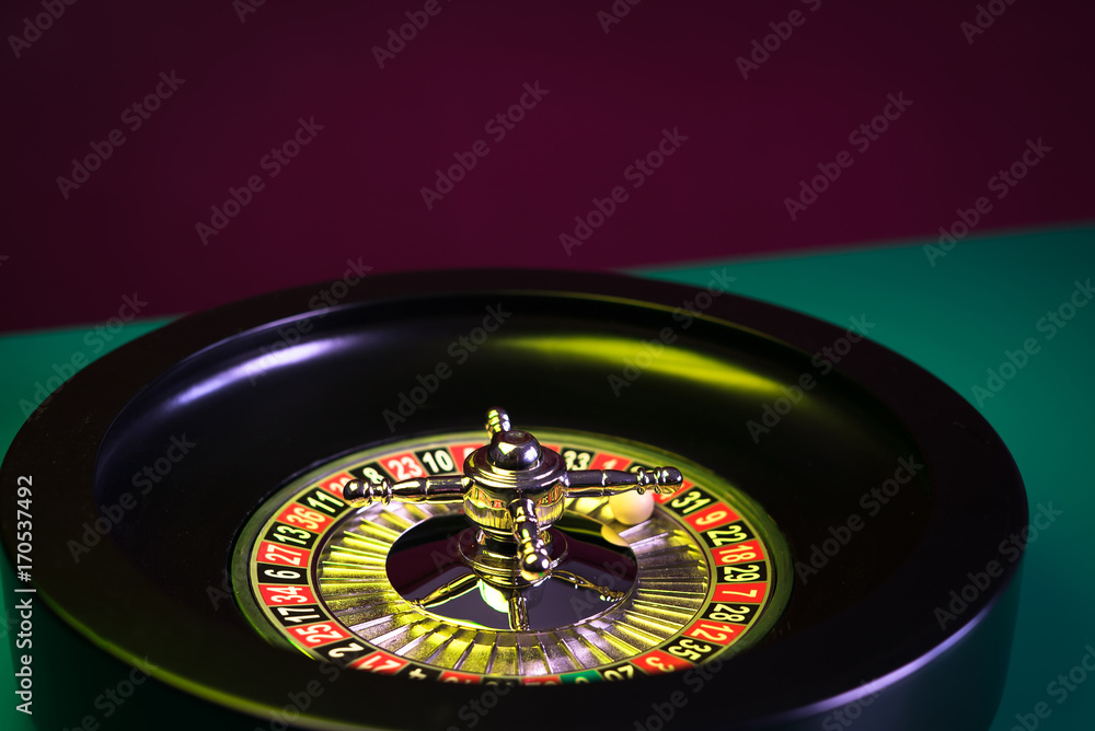 Roulette in casino and Poker Chips Roulette in casino and Poker Chips