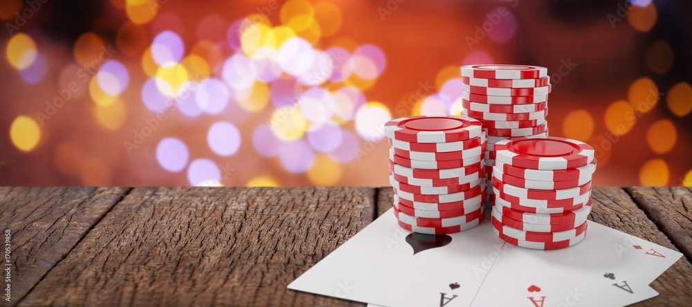 Obraz premium Composite image of red casino tokens with playing cards