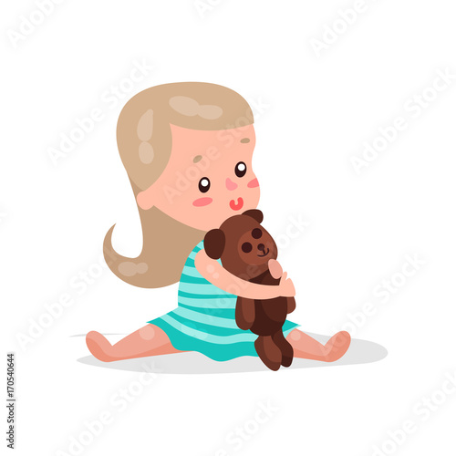 Adorable blonde little girl sitting on the floor hugging her teddy bear cartoon vector Illustration