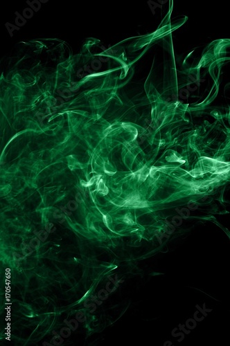 Abstract green smoke on black background, smoke background,green ink background,green, beautiful color smoke